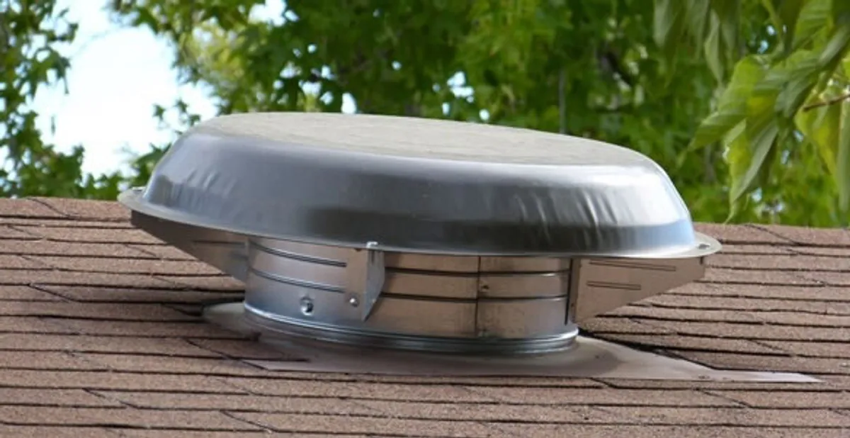 attic fan installation services with low-profile roof ventilation unit in Orlando, FL