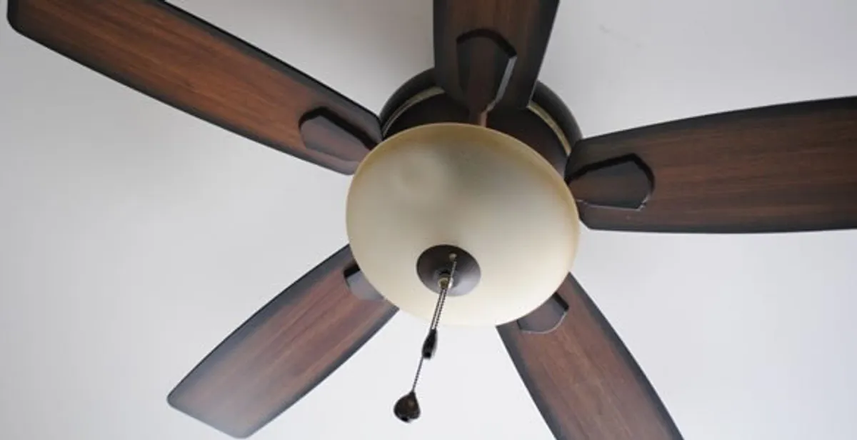 Fully installed ceiling fan with balanced blades and light fixture in Orlando, FL
