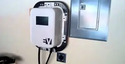 Electric car charger installation with wall-mounted EV charging station in Orlando, FL