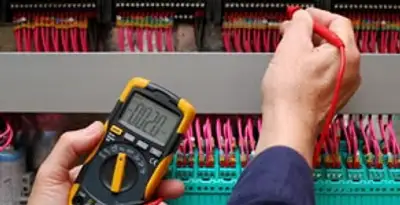 electrical service showing professional testing and troubleshooting of electrical panel by licensed electricians in Orlando, FL