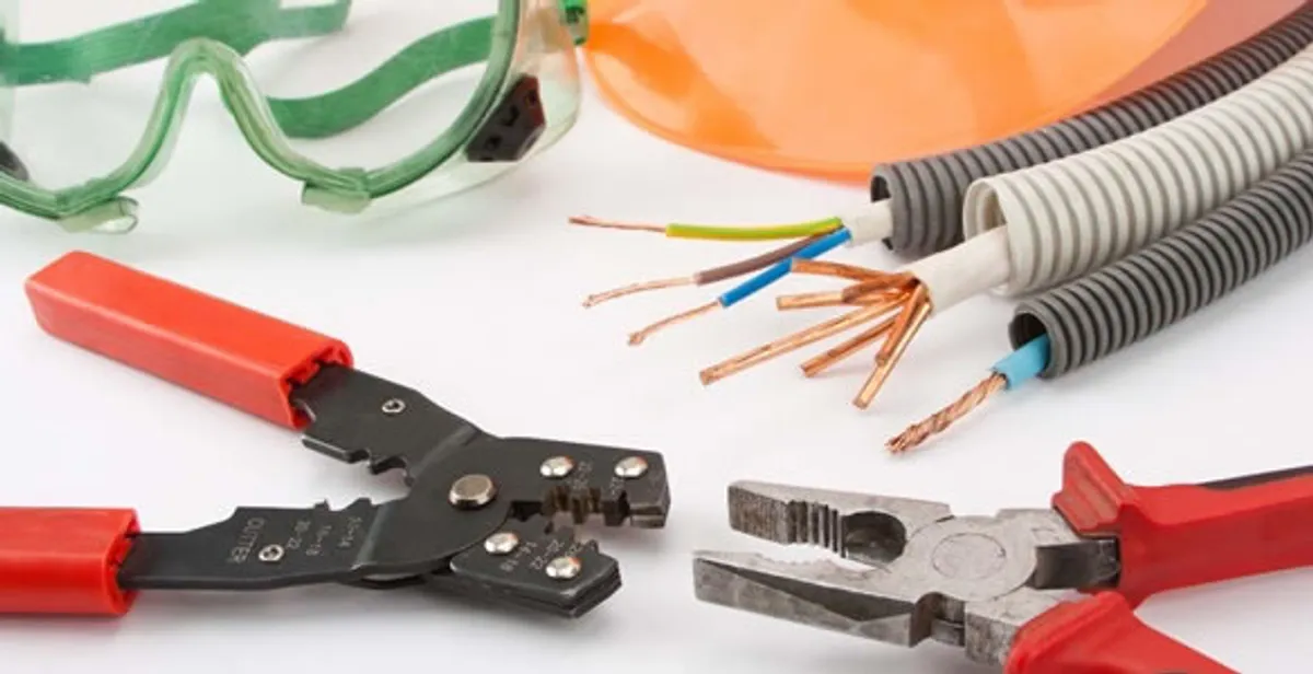 Electrical wiring repair with professional tools and safety equipment in Ocoee, FL