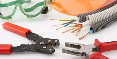 Electrical wiring repair with professional tools and safety equipment in Ocoee, FL