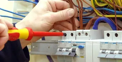 electrician services performing professional electrical panel wiring and connections in Orlando, FL