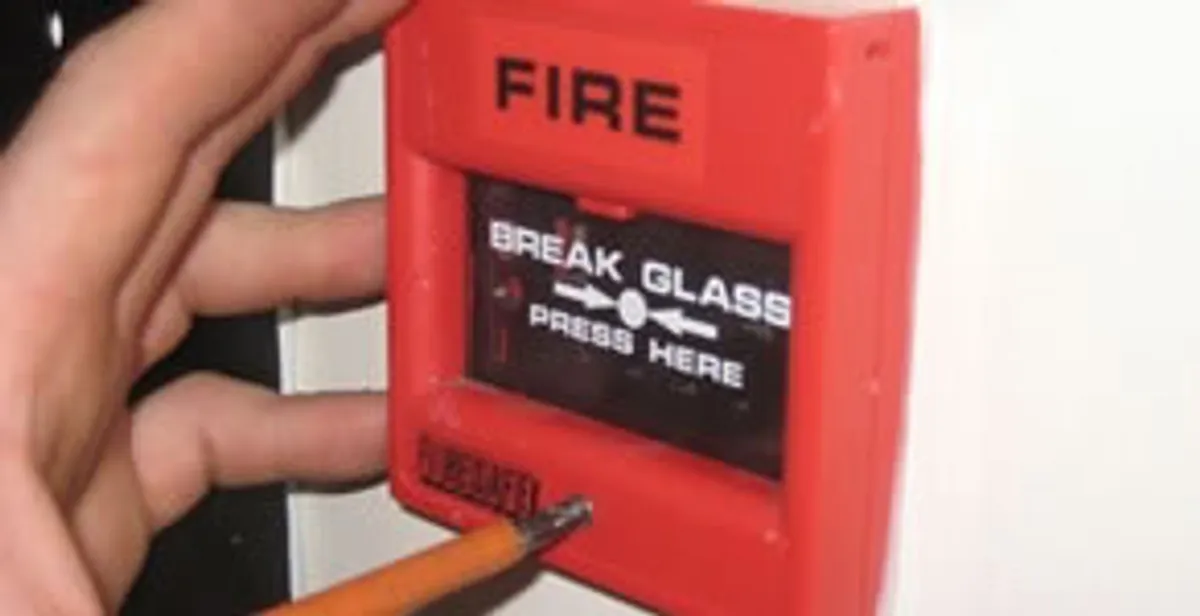 fire alarm installation service showing manual fire alarm pull station installed by licensed electricians in Orlando, FL