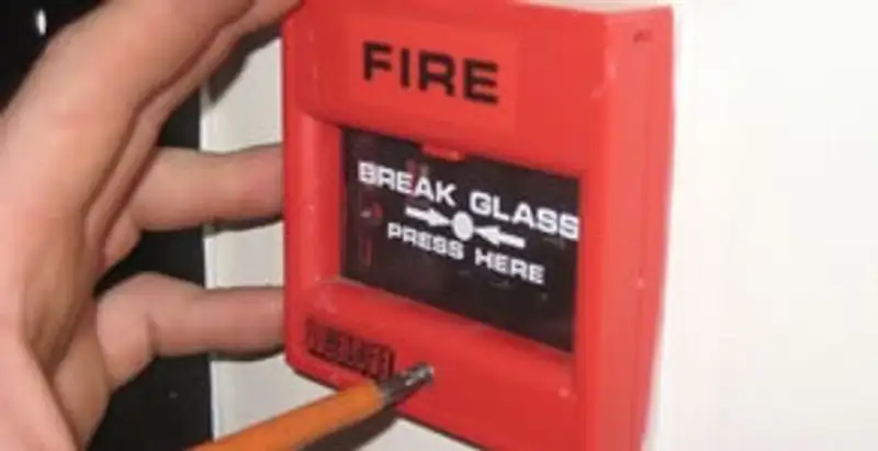 fire alarm installation service showing manual fire alarm pull station installed by licensed electricians in Orlando, FL