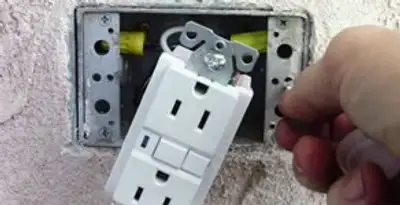gfci circuits service showing installation of a ground fault circuit interrupter outlet by licensed electricians in Orlando, FL