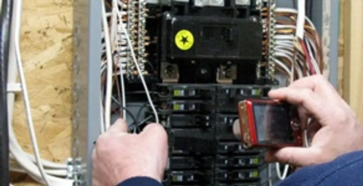 Home electrical inspection of circuit breaker panel by licensed electrician in Orlando, FL