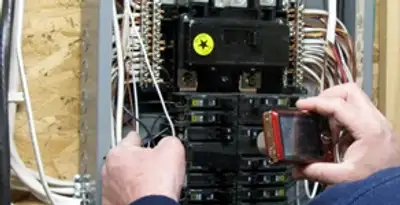 Home electrical inspection of circuit breaker panel by licensed electrician in Orlando, FL