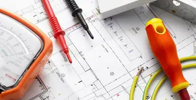 licensed electrician planning and testing electrical systems using professional tools in Orlando, FL