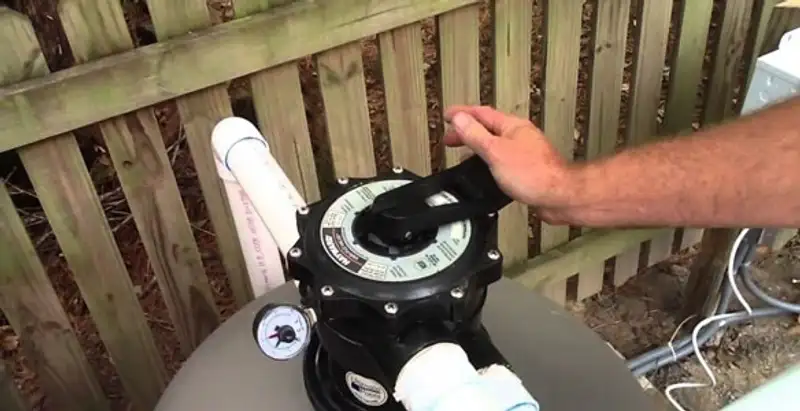 pool pumps service showing professional adjustment of pool pump control system in Orlando, FL