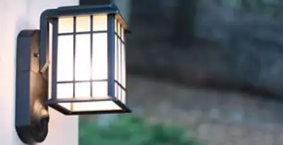 security light installation services with professionally mounted exterior wall light in Orlando, FL