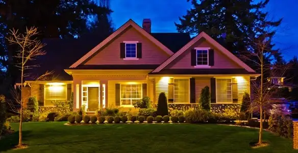 security light installation services illuminating a residential exterior at night in Orlando, FL