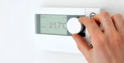 Thermostat installation service with professional adjusting temperature control in Orlando, FL