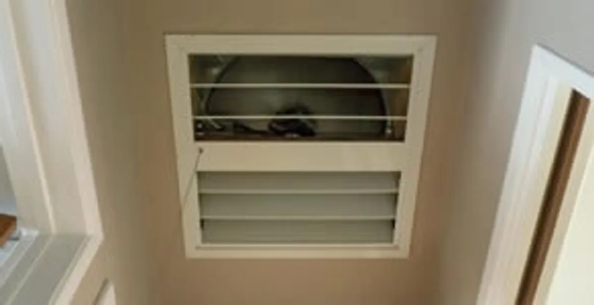 whole house fan installation services with ceiling-mounted ventilation system in Orlando, FL