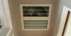 whole house fan installation services with ceiling-mounted ventilation system in Orlando, FL
